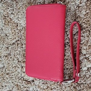 Thirty-one wallet All about the benjamins red in color.